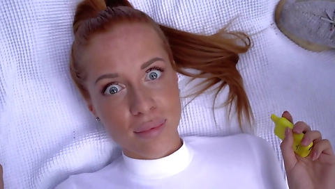 Blonde and brunette hair shows off her feet